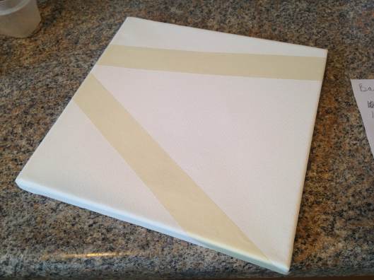Canvas with masking tape for clean areas.